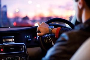 man driving car 